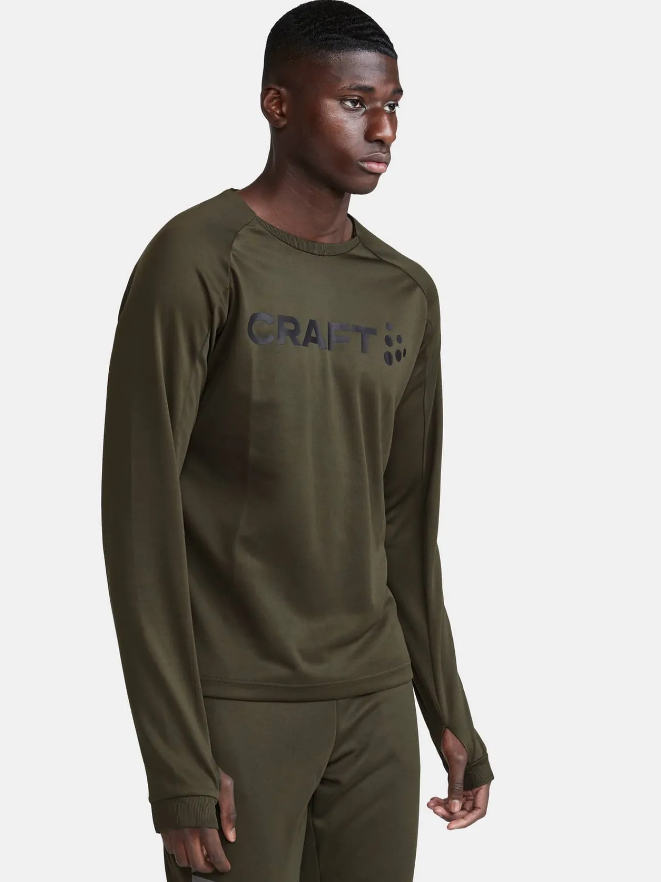 Craft Sportswear Mellanlager|Teamwear^Evolve Crew Neck M Juniper-Logo