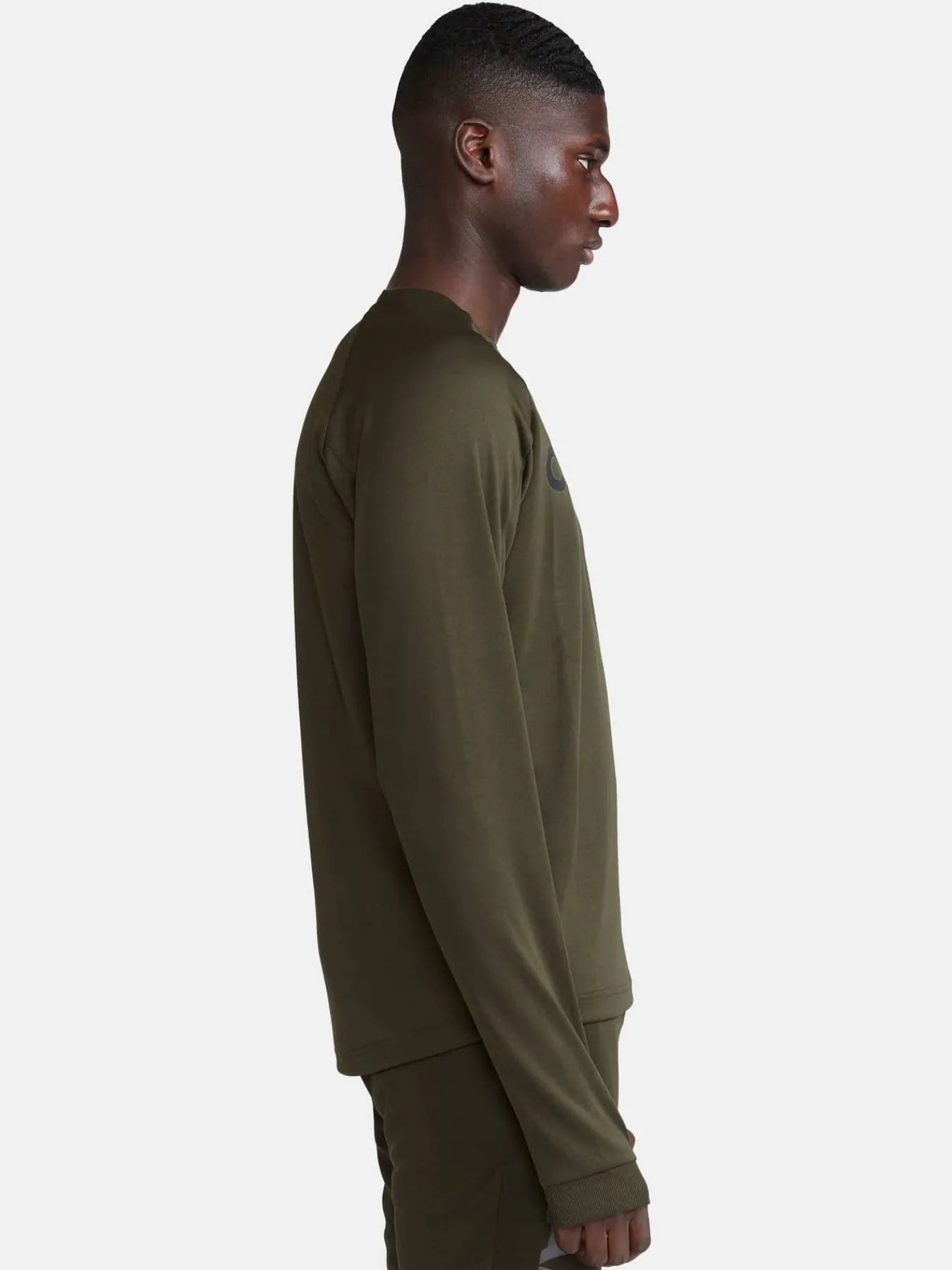 Craft Sportswear Mellanlager|Teamwear^Evolve Crew Neck M Juniper-Logo