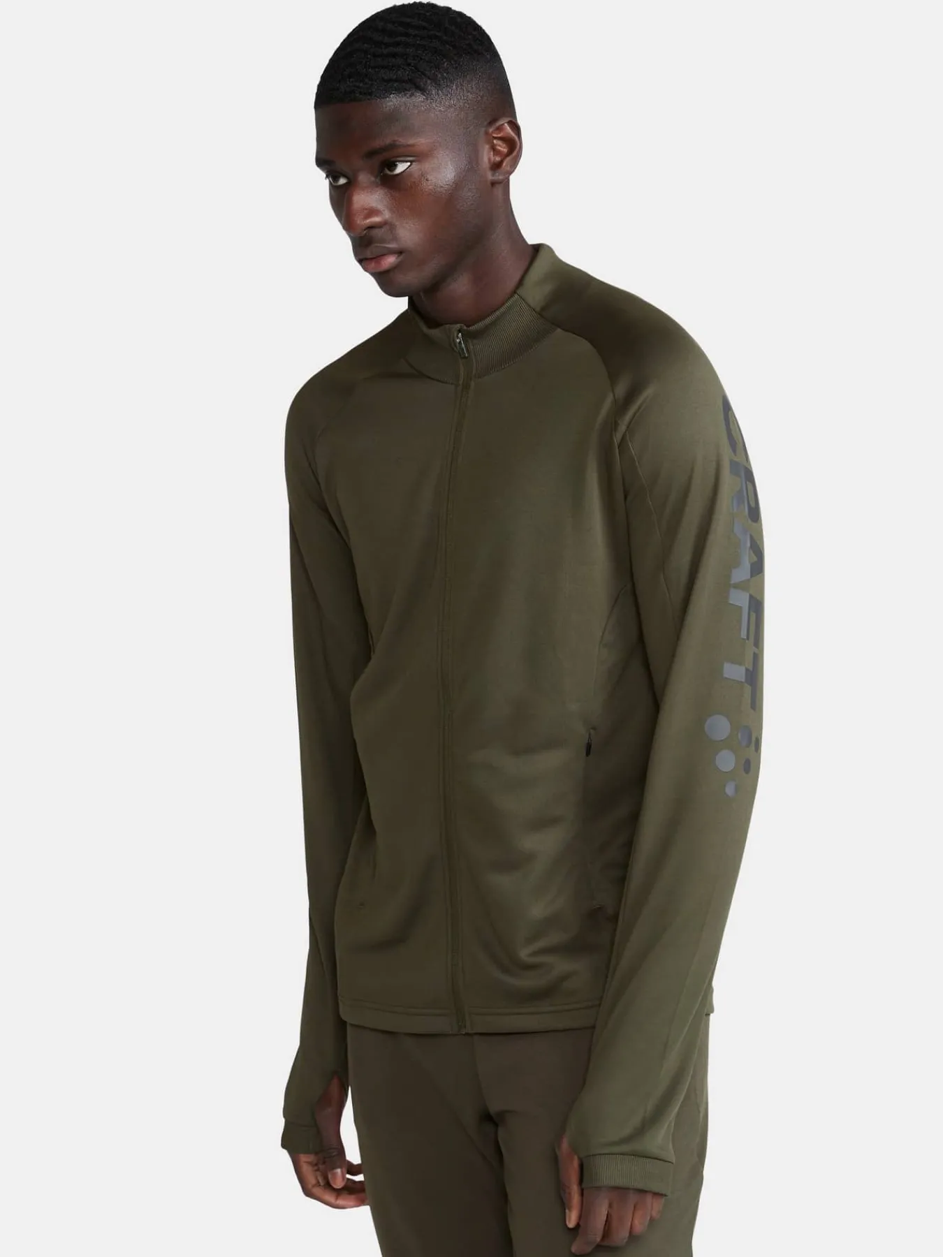 Craft Sportswear Mellanlager|Teamwear^Evolve Full Zip M Juniper-Logo