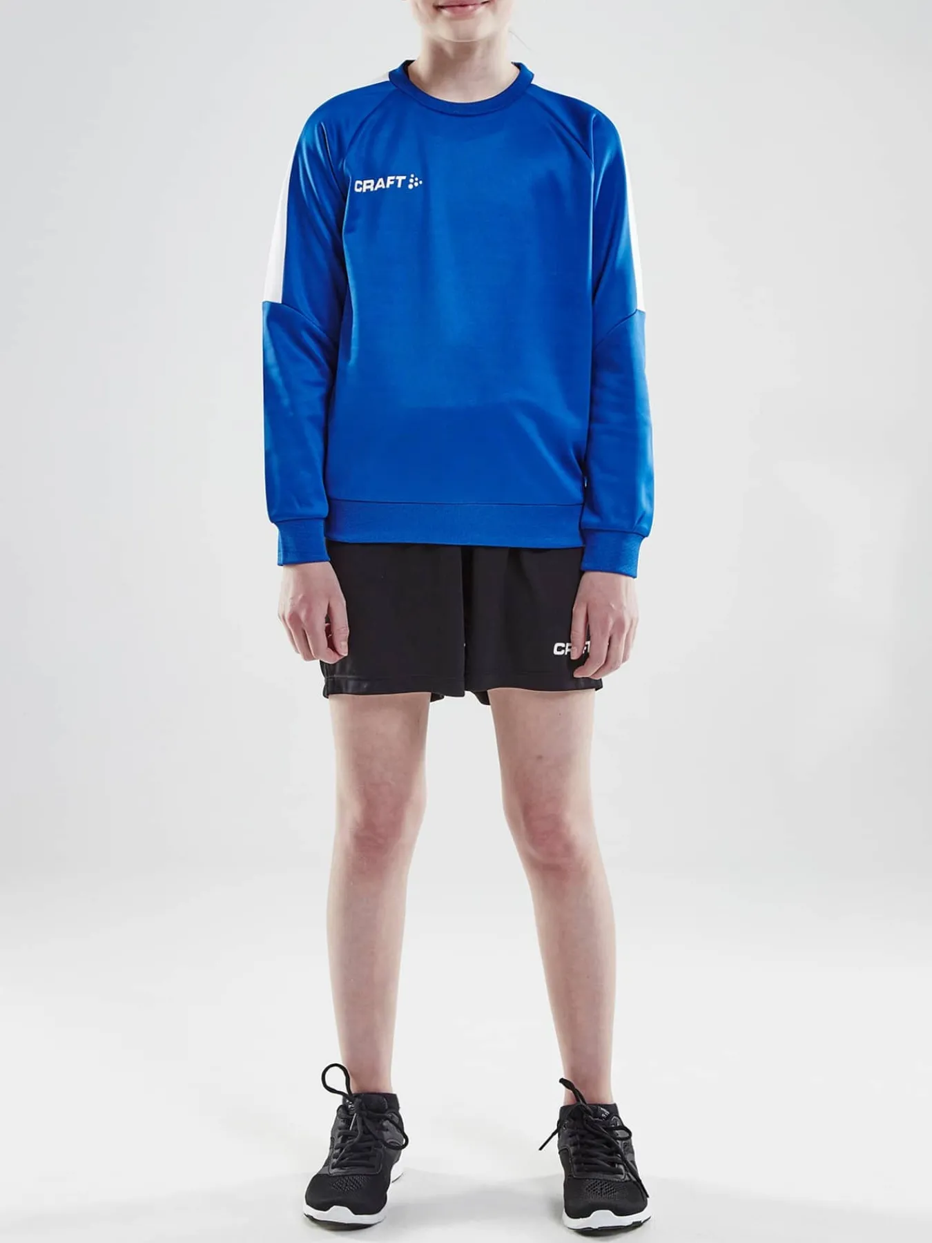 Craft Sportswear Sweatshirts & Hoodies^Progress R-Neck Sweater Jr Club Cobolt/White