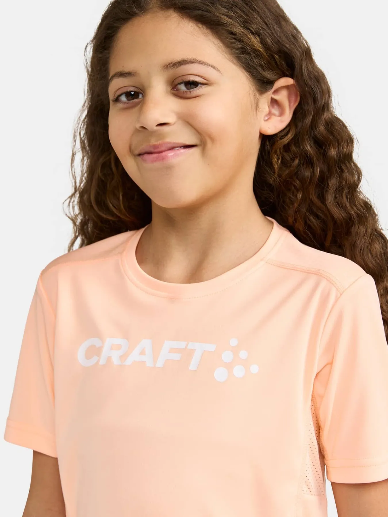 Craft Sportswear T-Shirt^Rush SS Tee Jr Cosmo-Logo