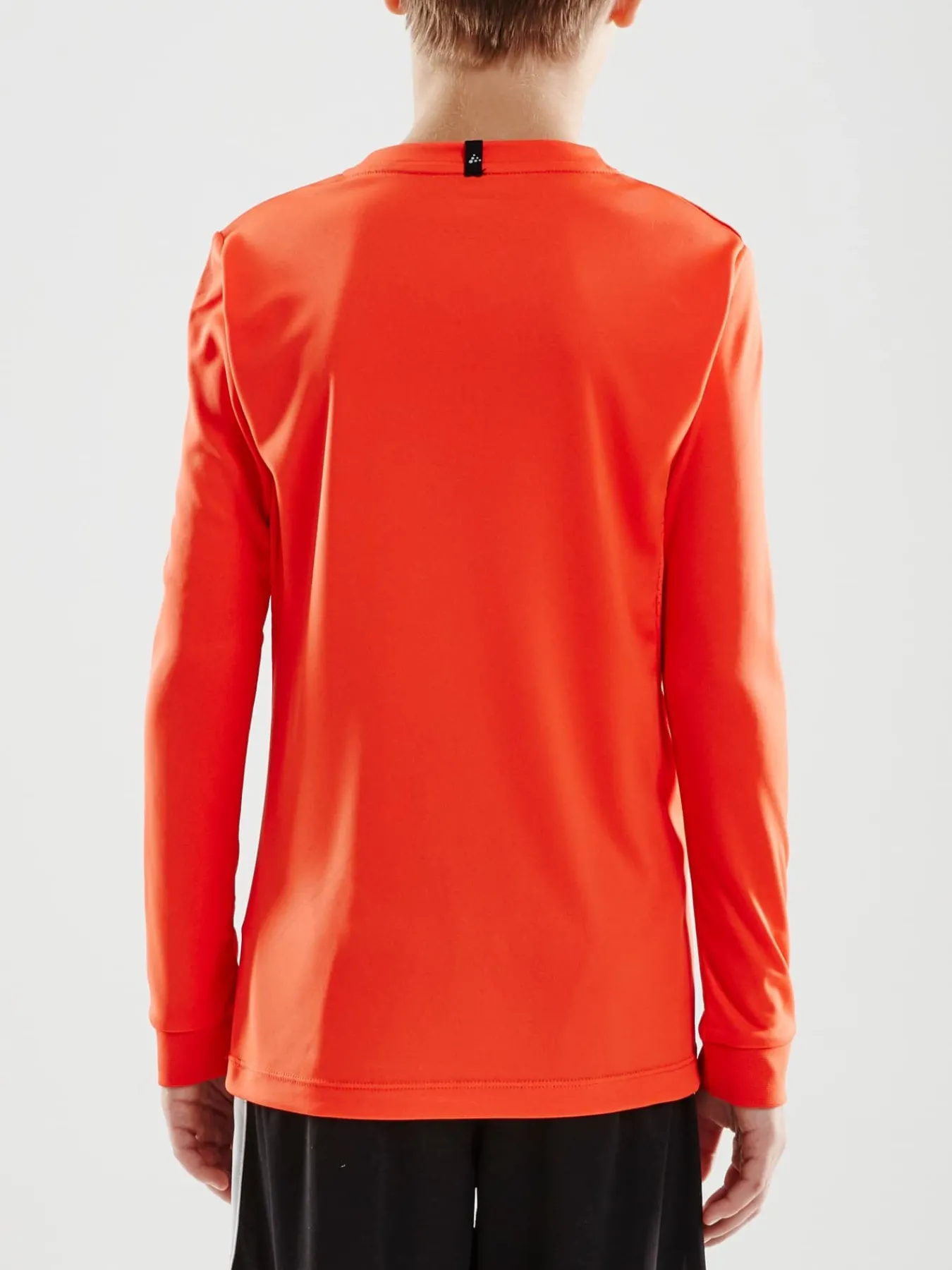 Craft Sportswear T-Shirt^Squad Go Jersey Solid Ls Jr Cocktail